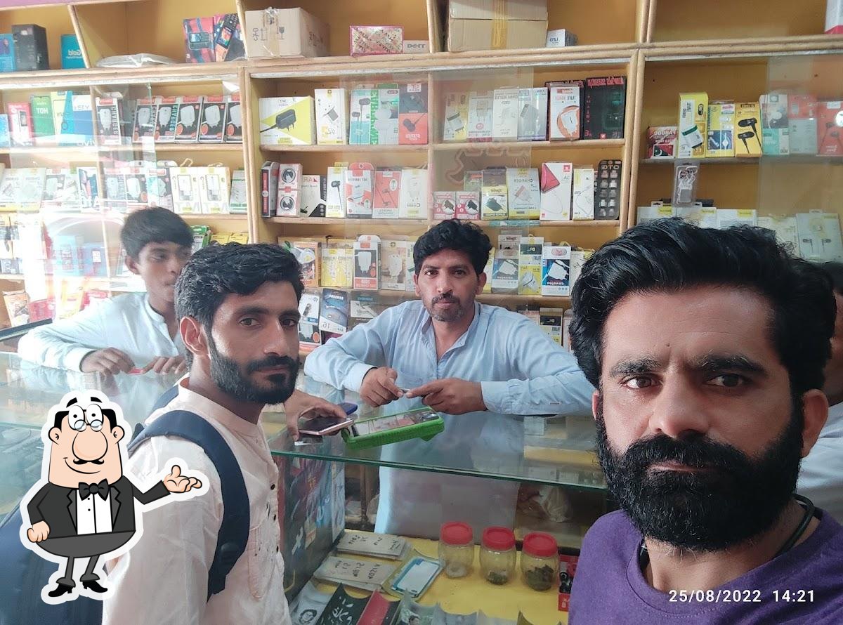 Malik Refreshment Point & Barbie.Q