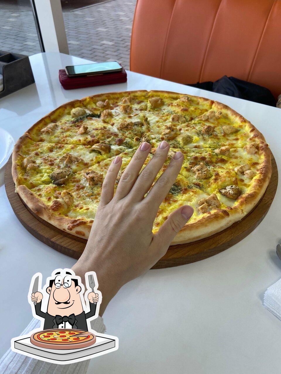 Попробуйте пиццу в "Bada Pizza".
