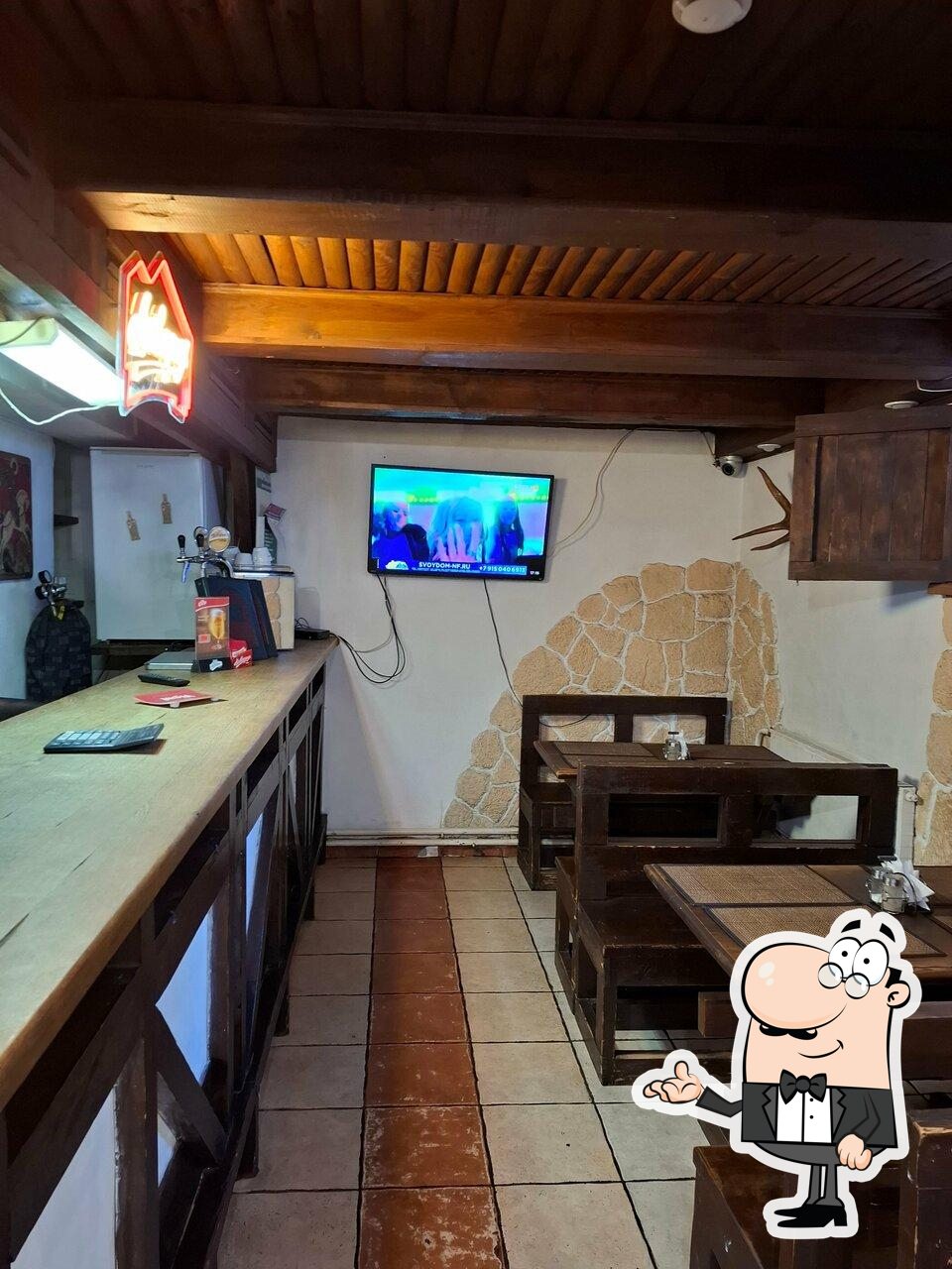 Забронируйте столик в "Корчма " Охотничья"".