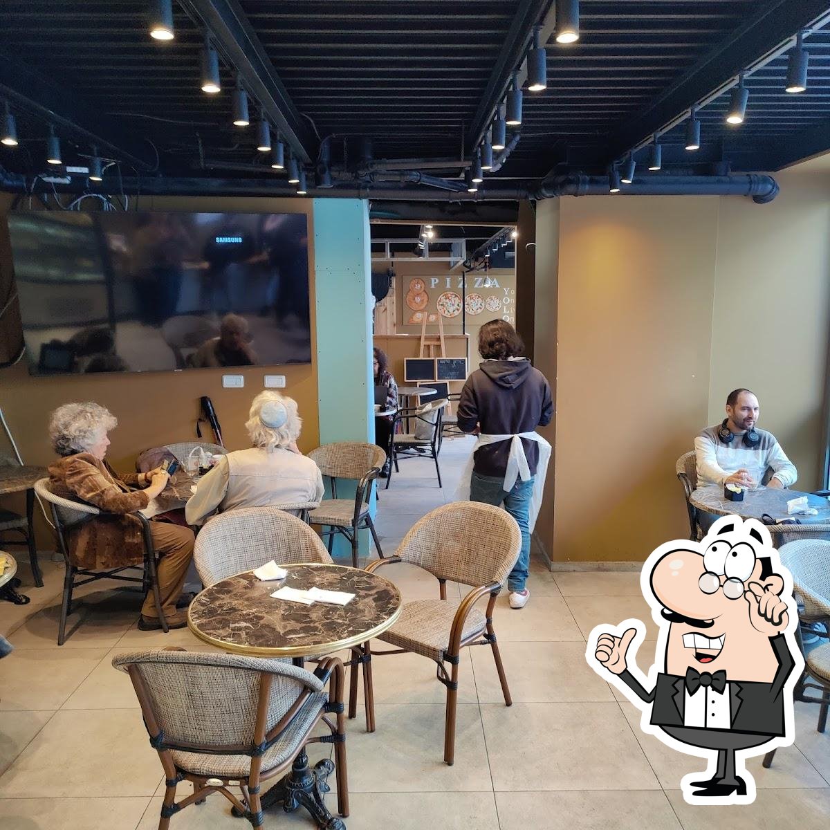 Посмотрите на внутренний интерьер "Yolo Bakery".