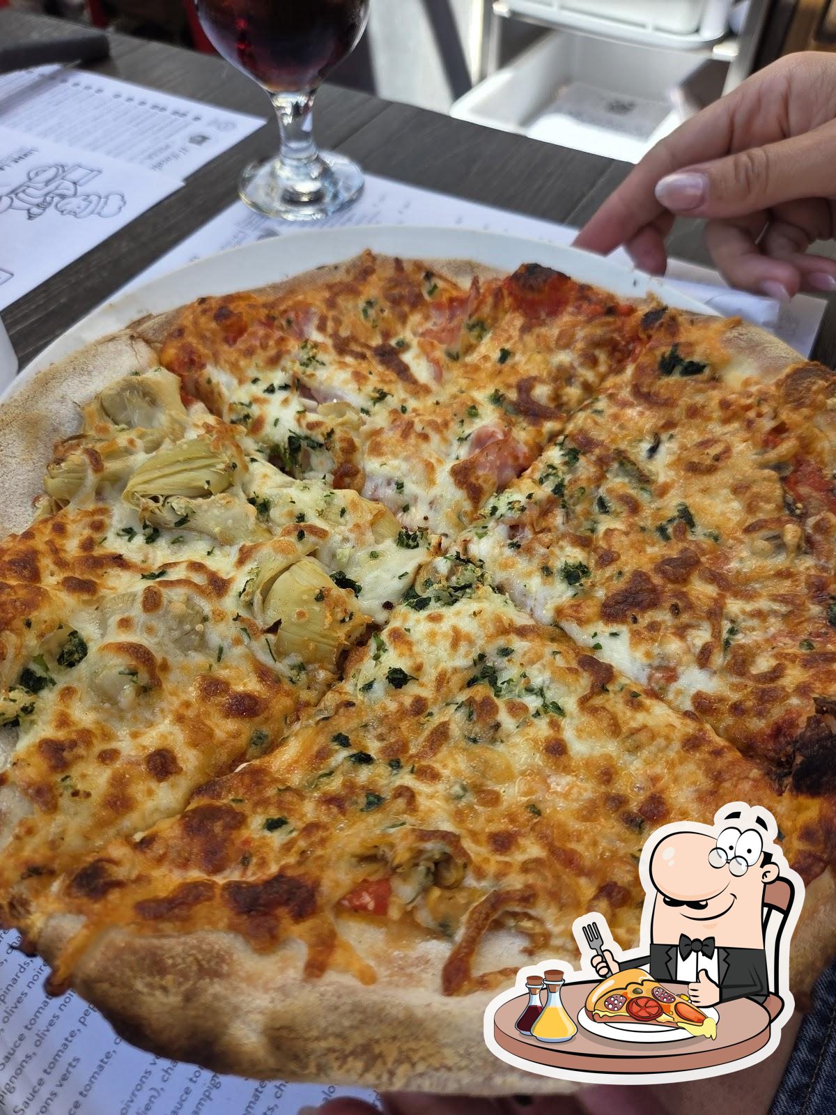  Отведайте пиццу в "Pizza Il Focolaio".