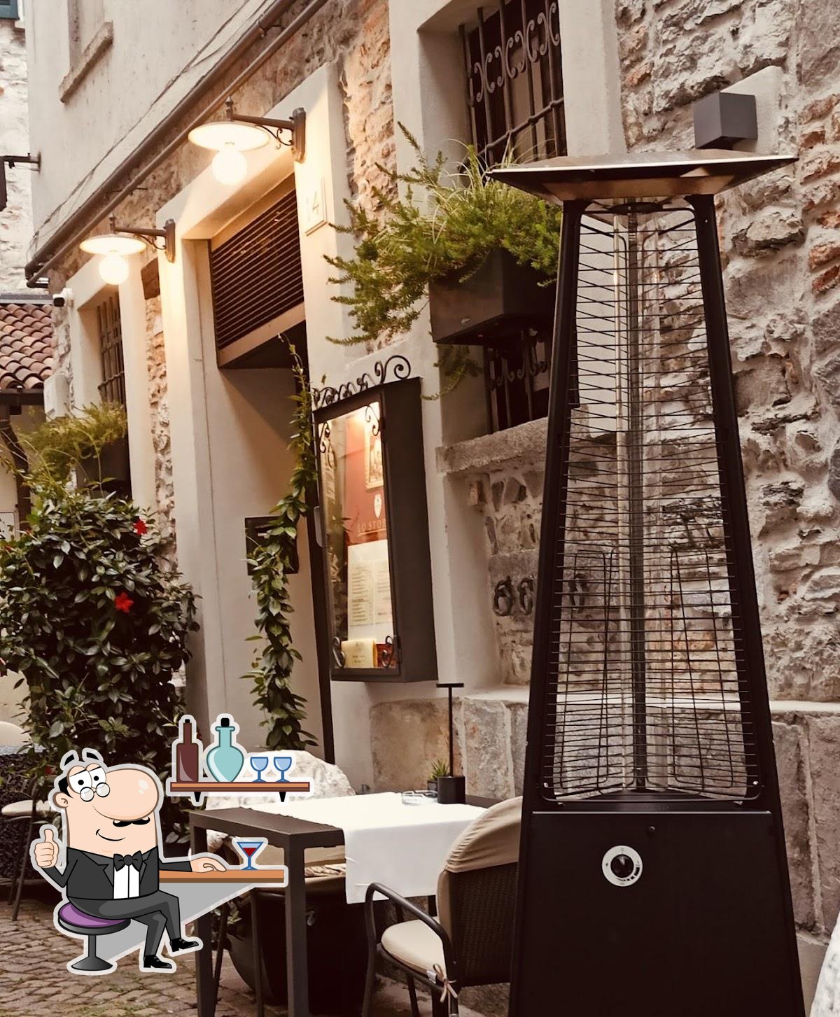 Посмотрите на внутренний интерьер "Ristorante Lo Storico in Como dal 1941".