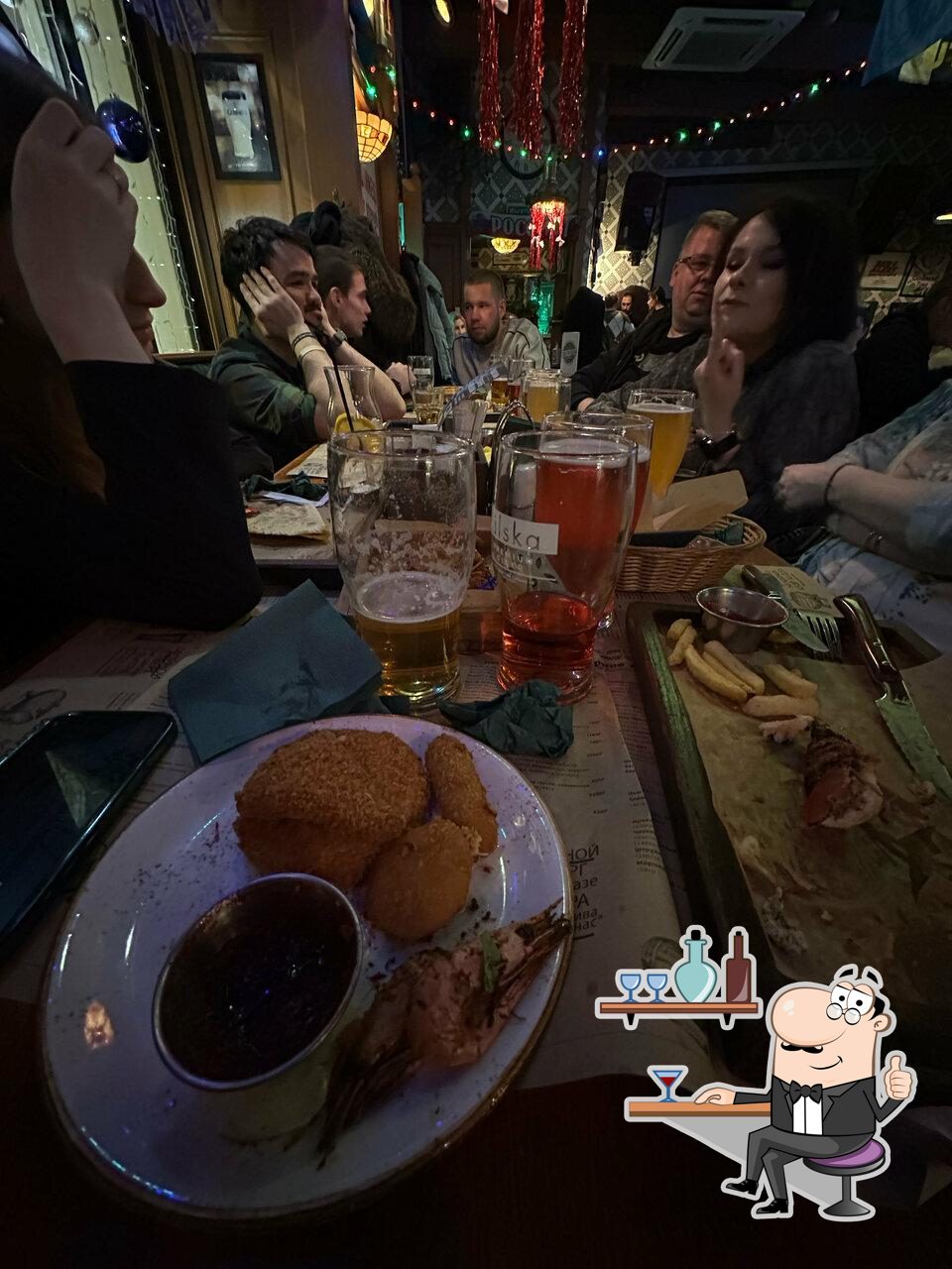 Забронируйте столик в "Dark Patrick's Pub".