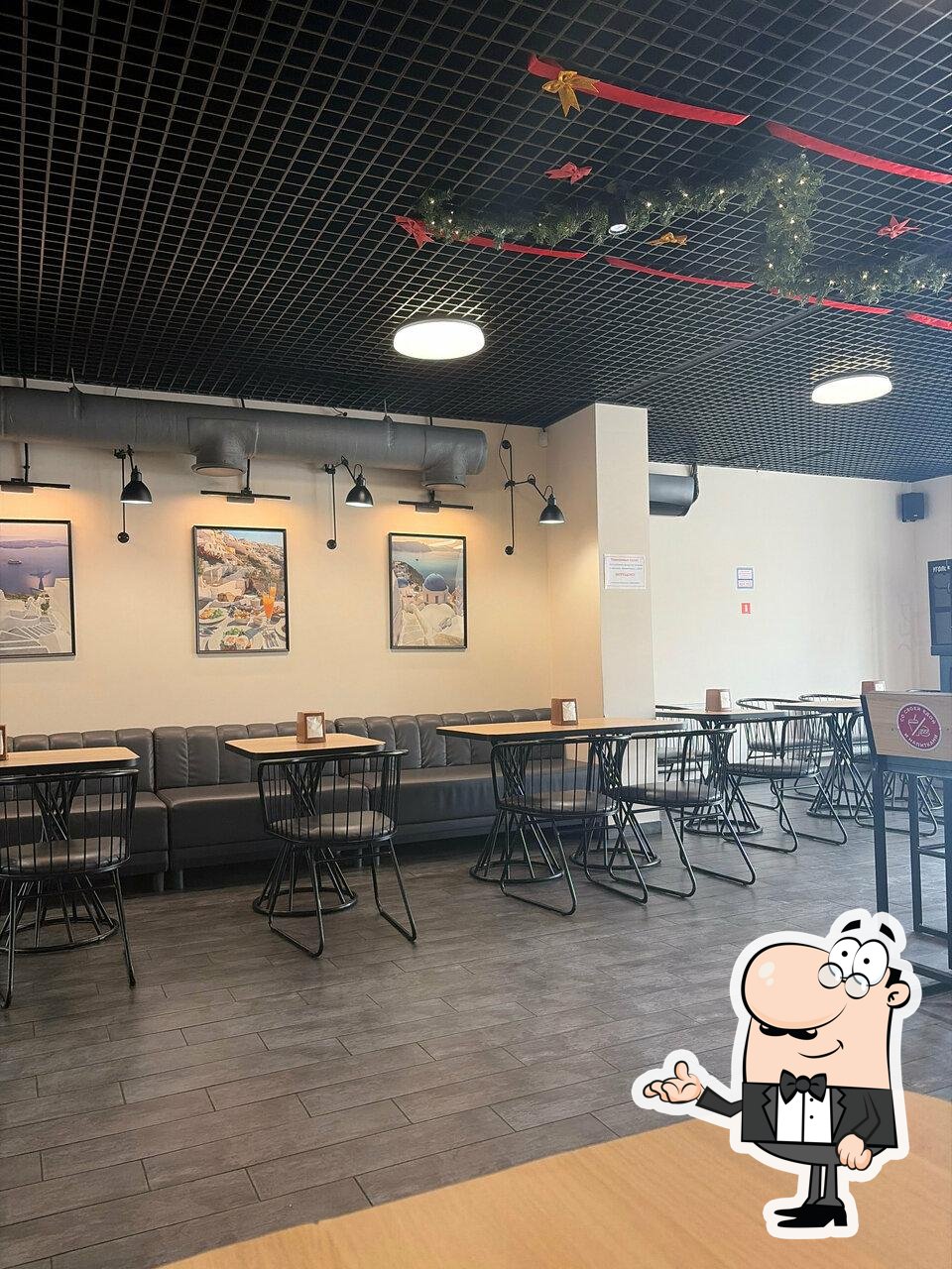 Посмотрите на внутренний интерьер "Greece Burger".