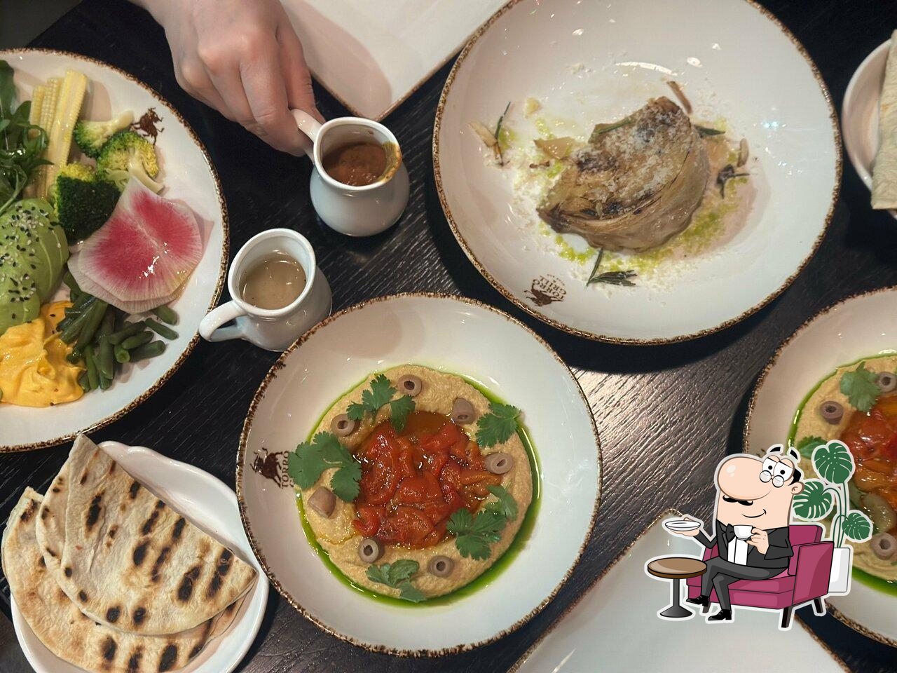 Забронируйте столик в "Torro Grill".