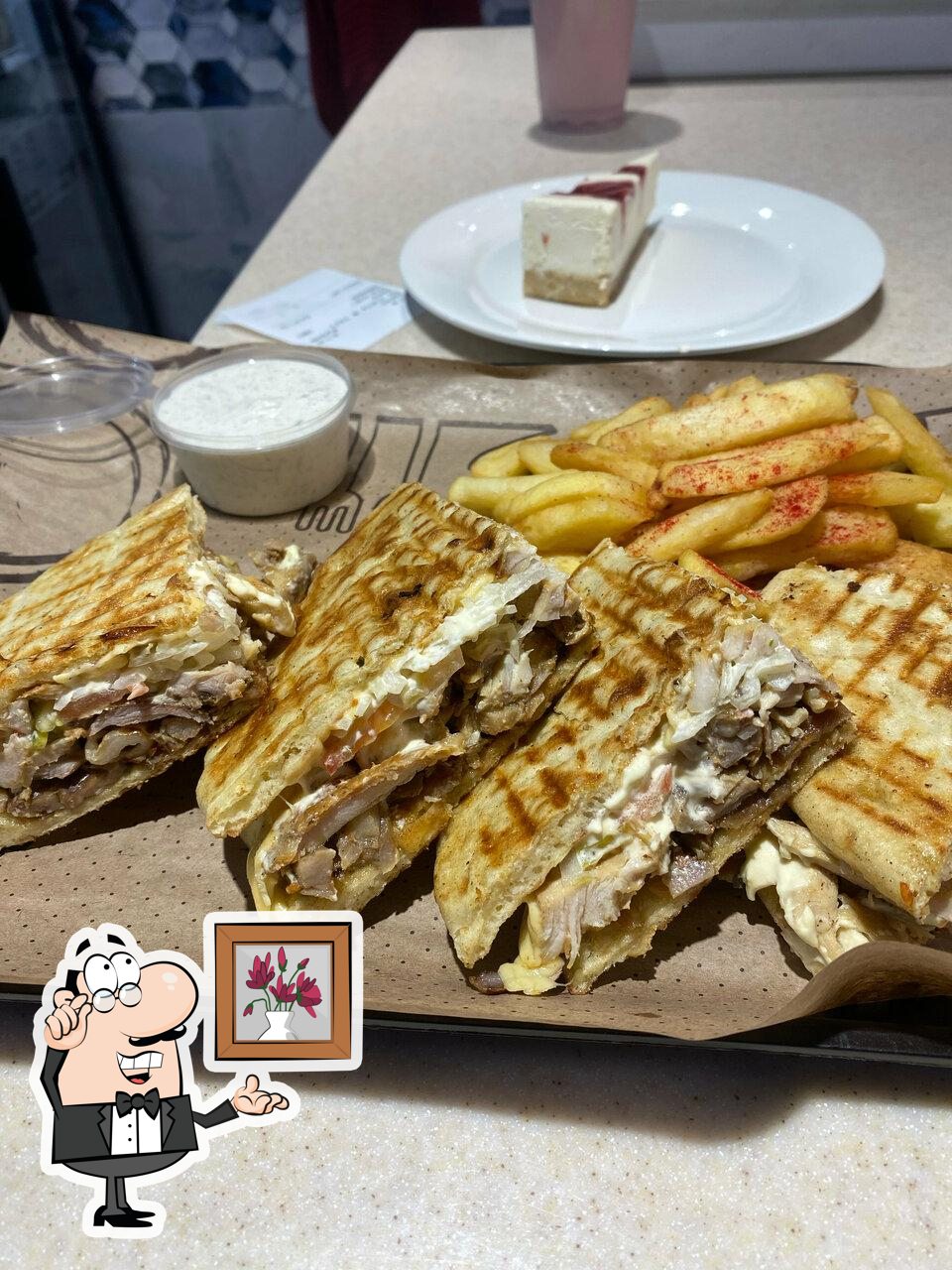 Забронируйте столик в "Greece Burger".
