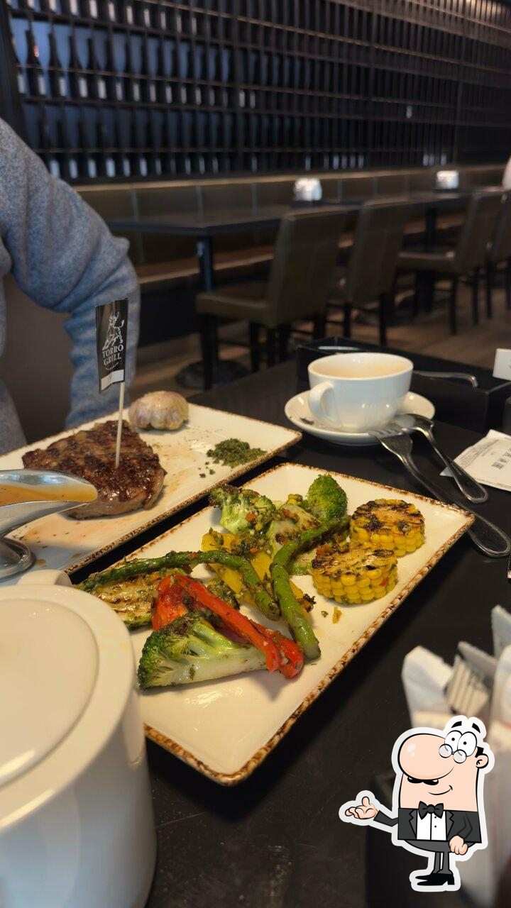 Забронируйте столик в "Torro Grill".