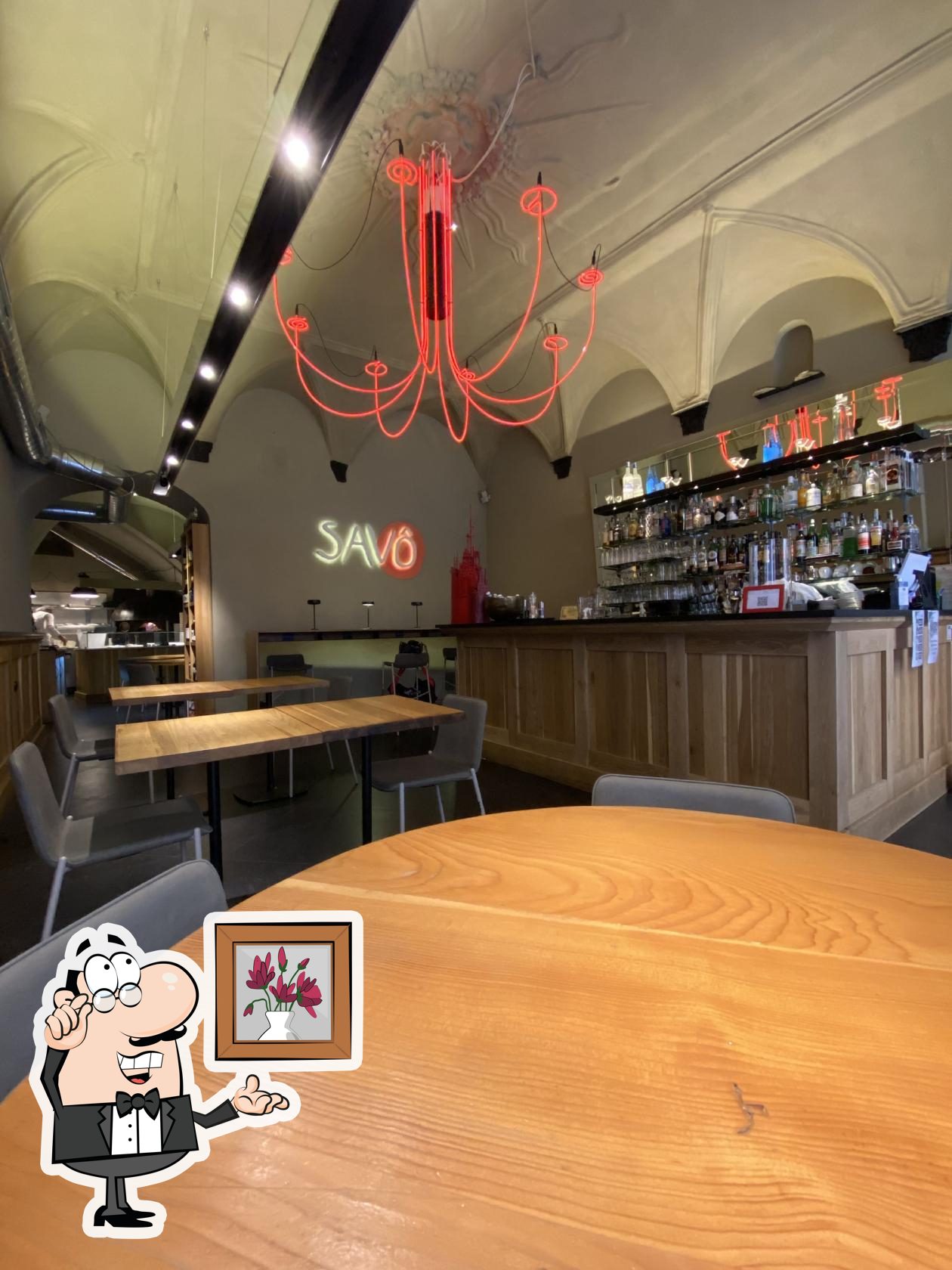 Посмотрите на внутренний интерьер "Savô Pizzeria Gourmet".